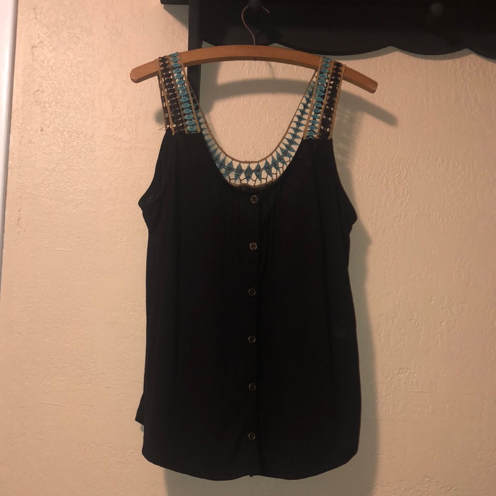Black tank with detailed back.